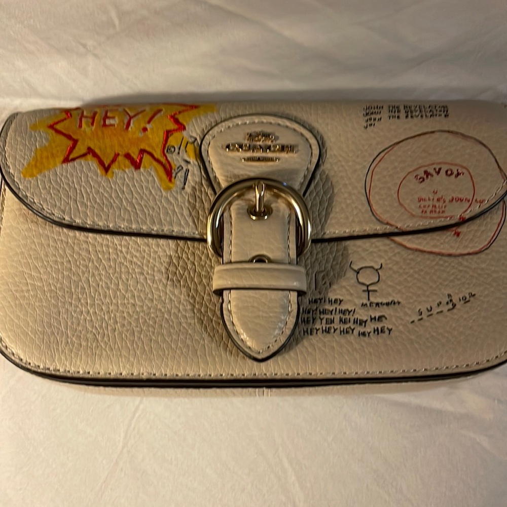 Coach x Michael Basquiat small wristlet.